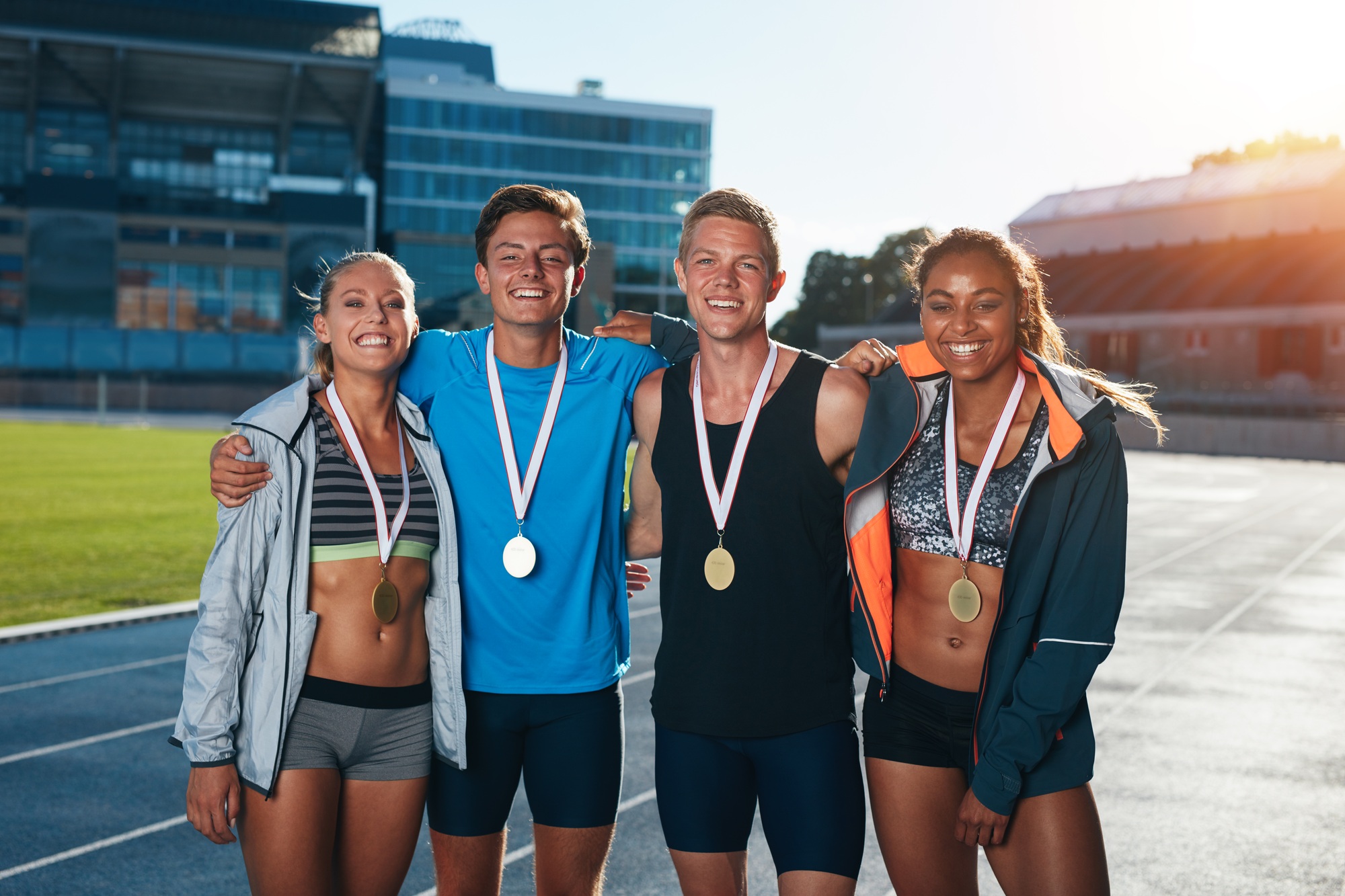 Inicio 4 Group of athletes with medals